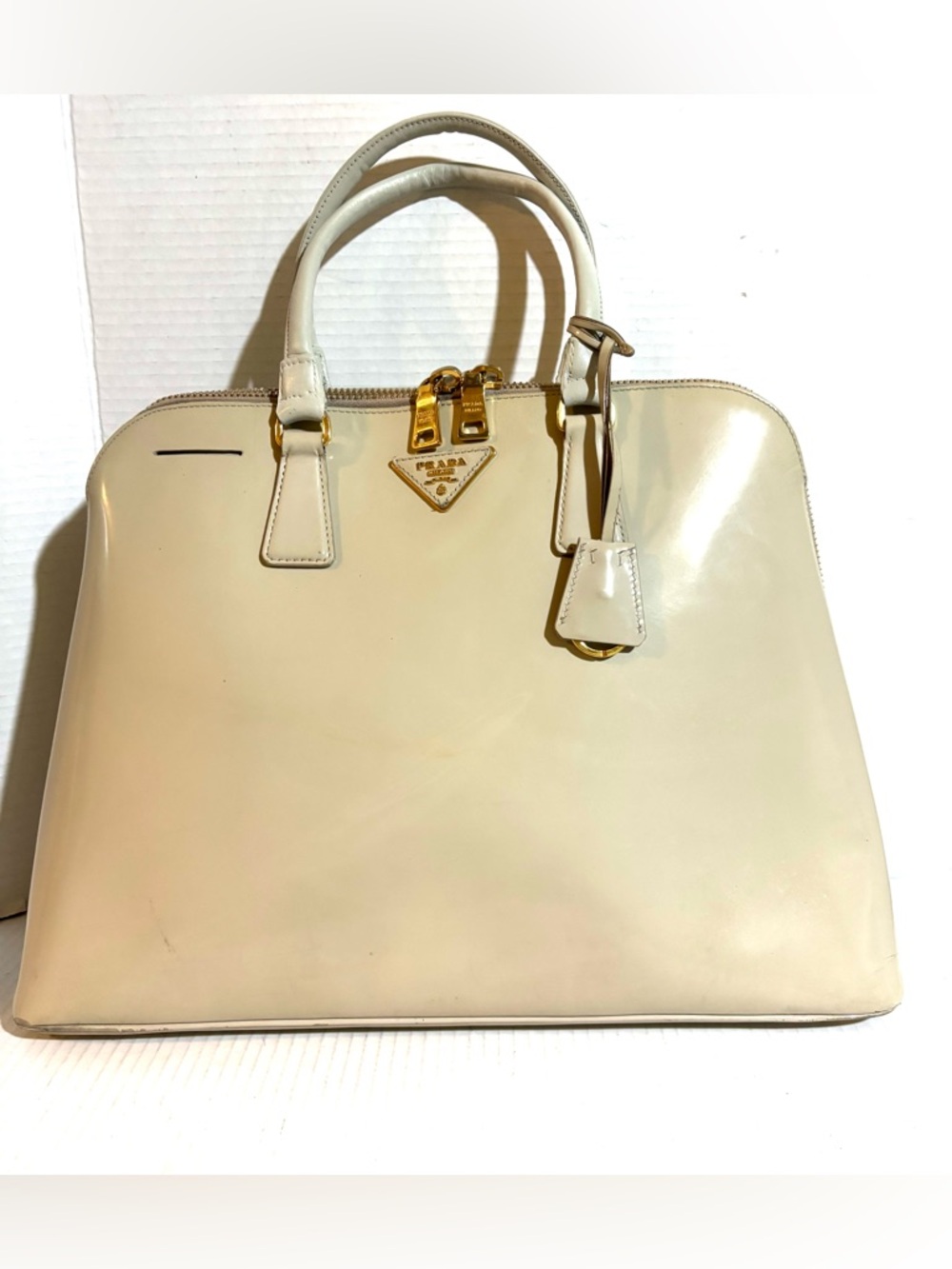 Prada Cream Patent Leather Dome Satchel With Gold Hardware